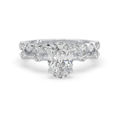 oval lab grown diamond pave wedding bridal ring set with sparkling round diamonds along the band in white gold