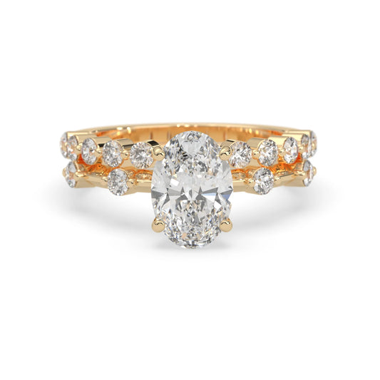 oval lab grown diamond pave wedding bridal ring set with sparkling round diamonds along the band in yellow gold