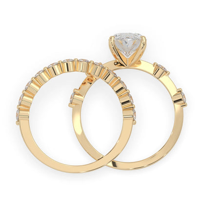oval lab grown diamond pave wedding bridal ring set with sparkling round diamonds along the band in yellow gold
