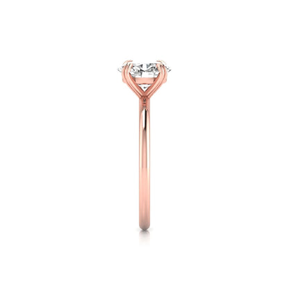 Oval lab grown diamond solitaire engagement ring featuring a 1.86 carat IGI certified oval diamond in a classic four-prong rose gold setting.