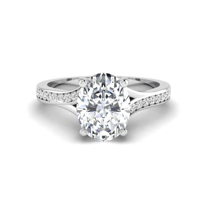 IGI Certified 1.86 carat Oval cut lab grown diamond solitaire engagement ring with round pave diamond band in white gold.