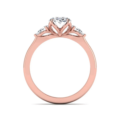 Oval & Pear Three Stone Lab Grown Diamond Engagement Ring featuring a 9.00 × 7.00 mm IGI Certified oval-cut center diamond with pear-cut side diamonds in rose gold.