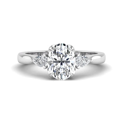 Oval & Pear Three Stone Lab Grown Diamond Engagement Ring featuring a 9.00 × 7.00 mm IGI Certified oval-cut center diamond with pear-cut side diamonds in white gold.