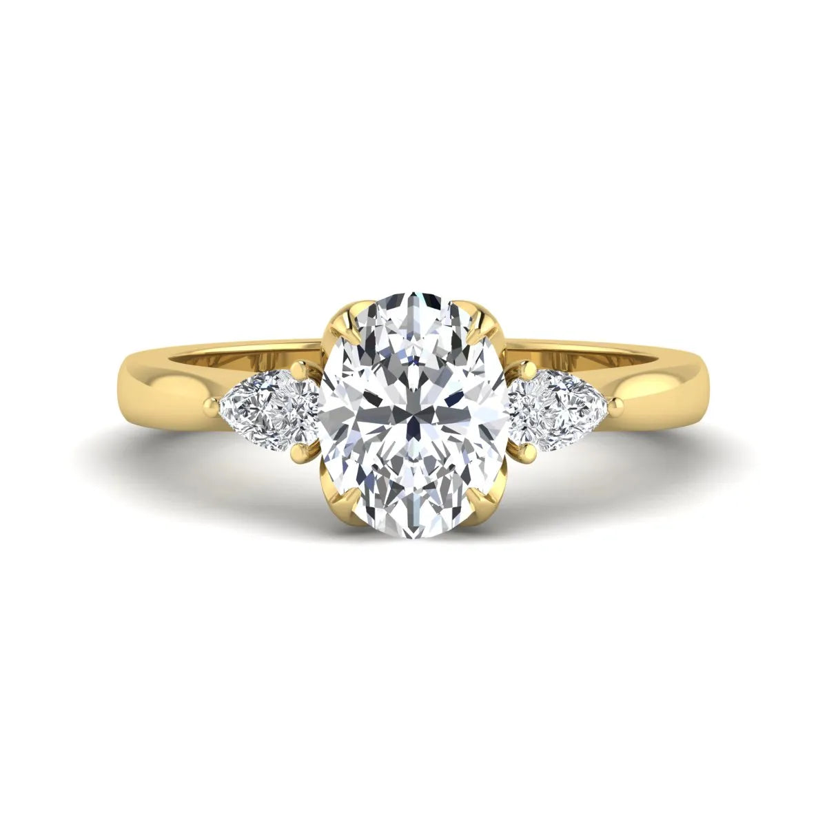 Oval & Pear Three Stone Lab Grown Diamond Engagement Ring featuring a 9.00 × 7.00 mm IGI Certified oval-cut center diamond with pear-cut side diamonds in yellow gold.