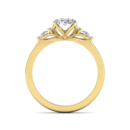 Oval & Pear Three Stone Lab Grown Diamond Engagement Ring featuring a 9.00 × 7.00 mm IGI Certified oval-cut center diamond with pear-cut side diamonds in yellow gold.