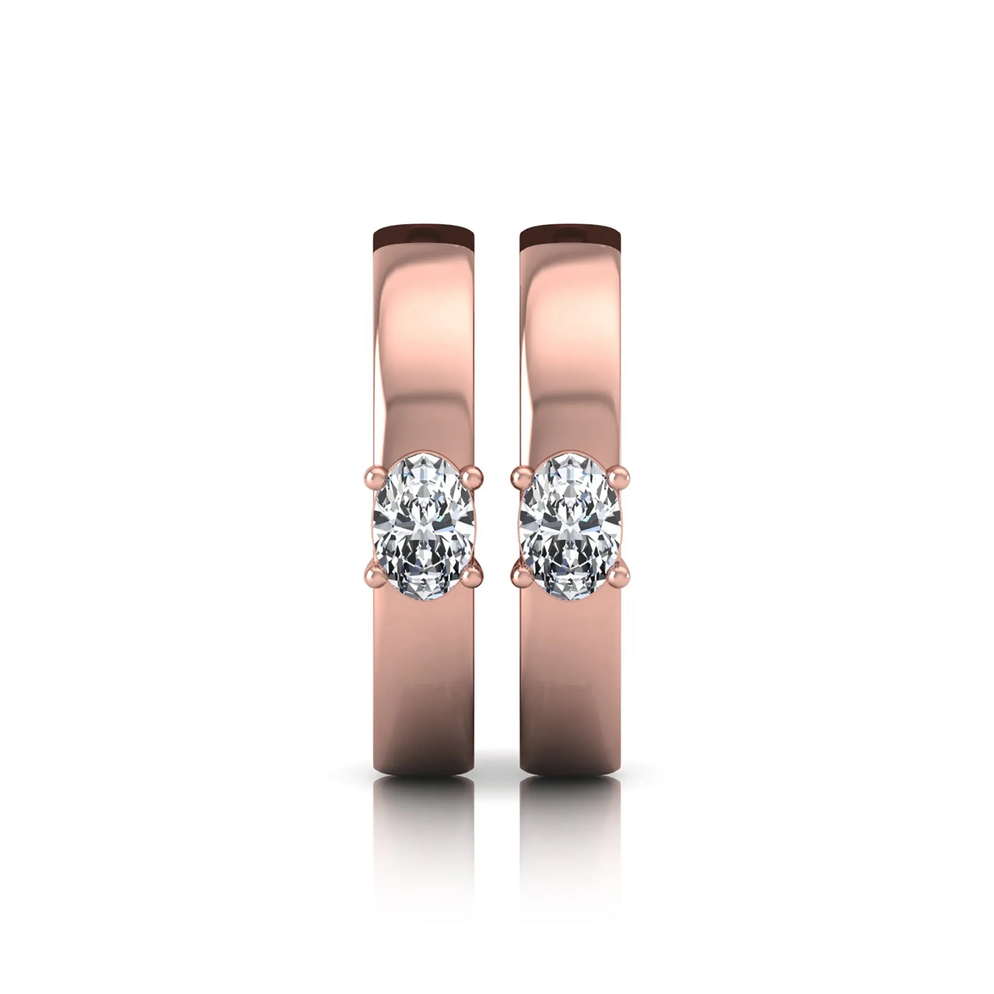 Oval cut lab grown diamond huggie hoop earrings featuring a classic four prong setting and hinged snap closure shown in rose gold tone with a polished finish.