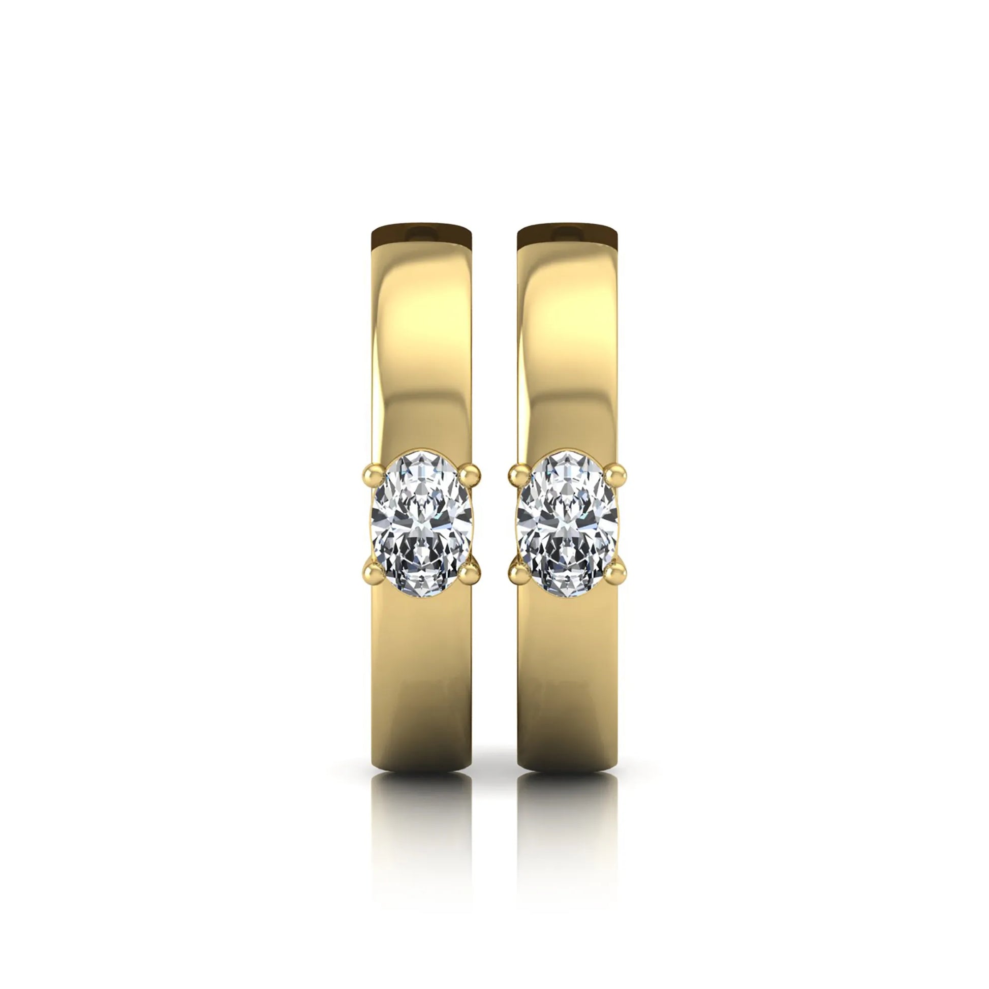 Oval cut lab grown diamond huggie hoop earrings featuring a classic four prong setting and hinged snap closure shown in yellow gold tone with a polished finish.