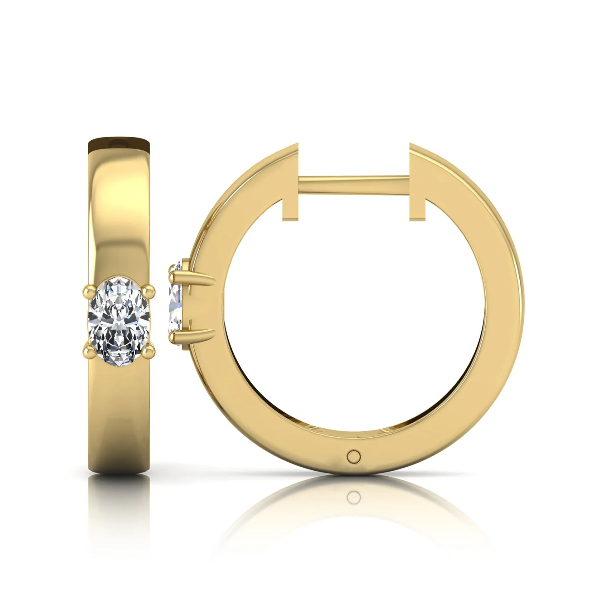 Oval cut lab grown diamond huggie hoop earrings featuring a classic four prong setting and hinged snap closure shown in yellow gold tone with a polished finish.