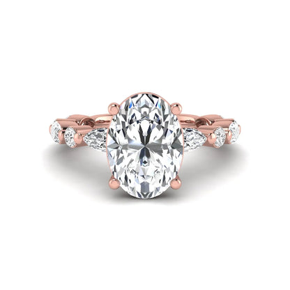 Oval prong set lab grown diamond engagement ring featuring a 2.50 carat oval center diamond with marquise and round accent diamonds in rose gold finish.