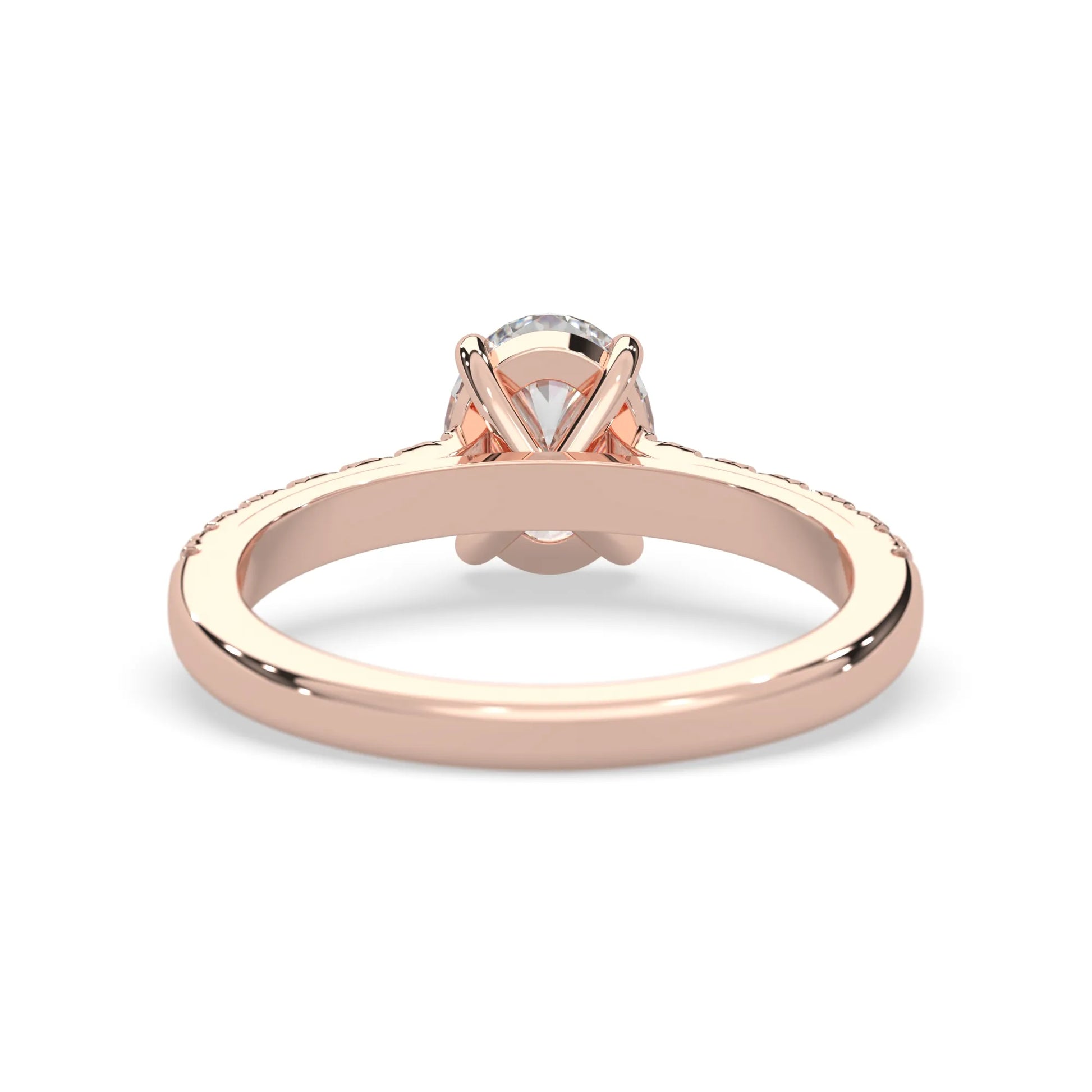 Oval cut lab grown diamond prong set engagement ring with pavé band and rose gold  metal tone design