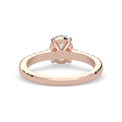 Oval cut lab grown diamond prong set engagement ring with pavé band and rose gold  metal tone design