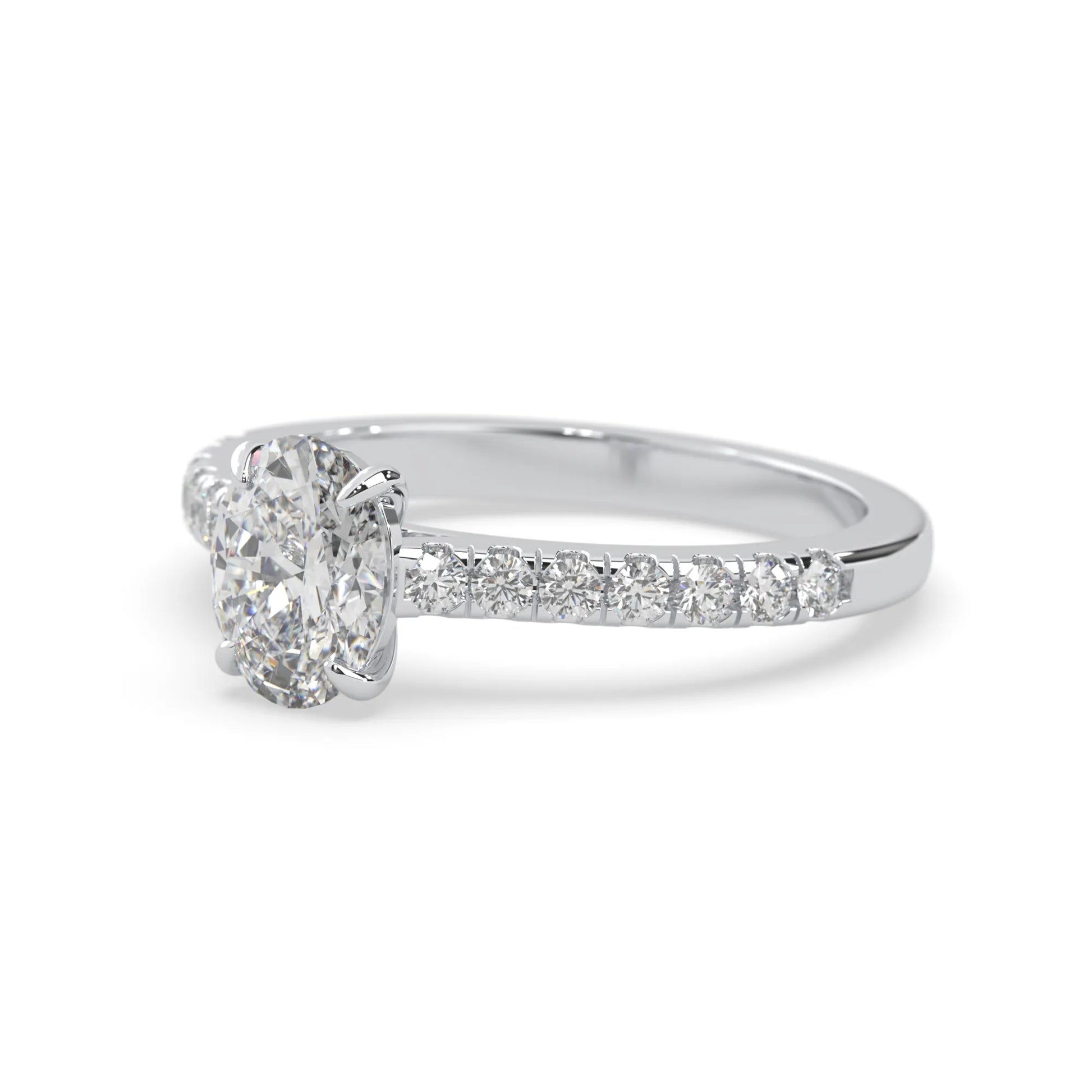 Oval cut lab grown diamond prong set engagement ring with pavé band and white gold  metal tone design
