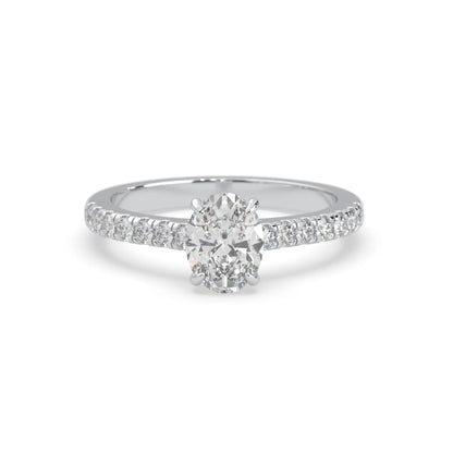 Oval cut lab grown diamond prong set engagement ring with pavé band and white gold  metal tone design