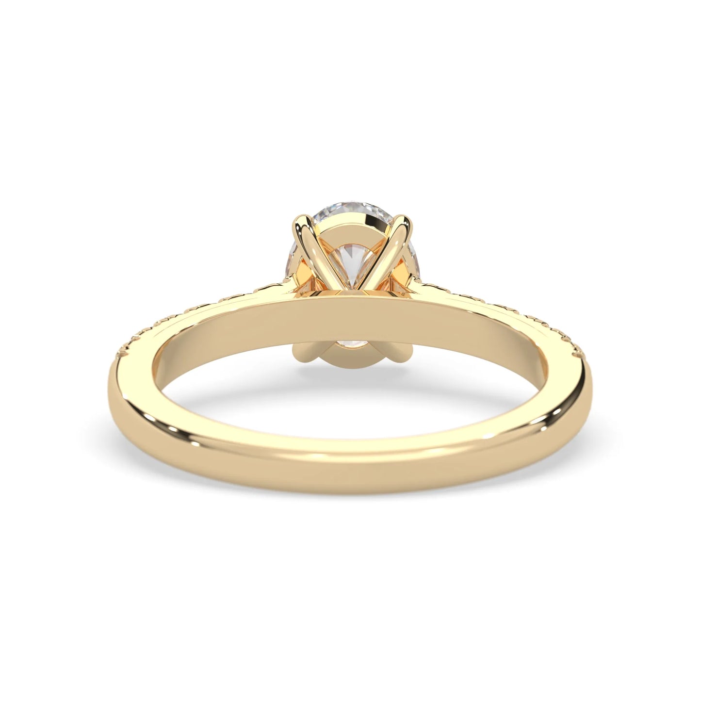 Oval cut lab grown diamond prong set engagement ring with pavé band and yellow gold  metal tone design