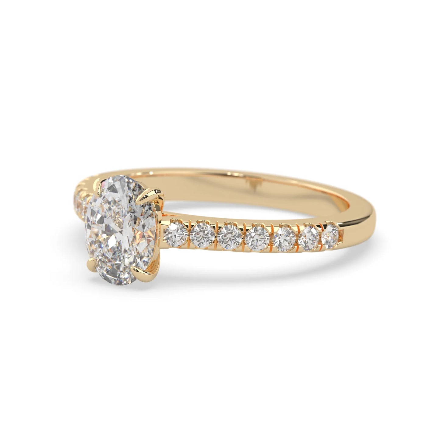 Oval cut lab grown diamond prong set engagement ring with pavé band and yellow gold  metal tone design
