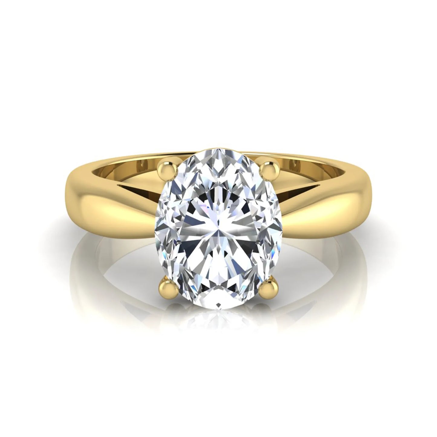 Oval cut lab grown diamond solitaire engagement ring with a four prong setting and yellow gold tone band.