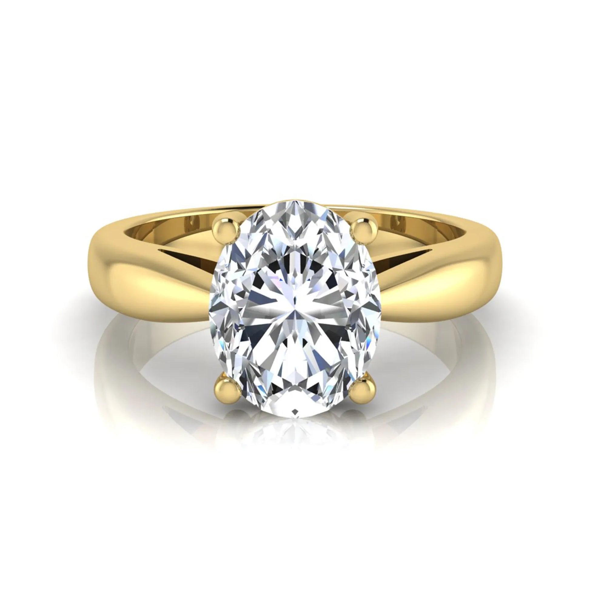 Oval cut lab grown diamond solitaire engagement ring with a four prong setting and yellow gold tone band.