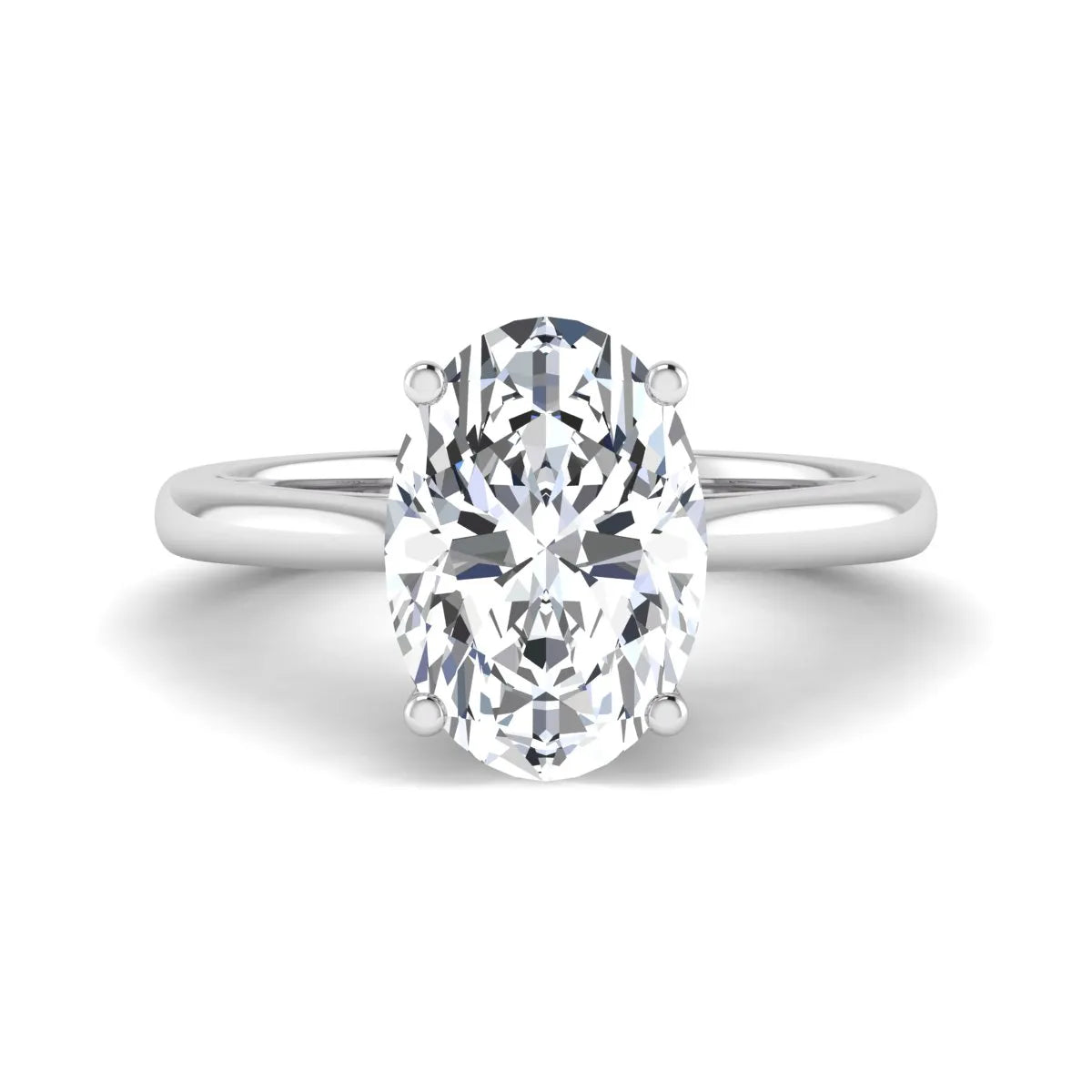 Oval cut lab grown diamond solitaire engagement ring with classic prong setting and white gold tone shown for design reference.
