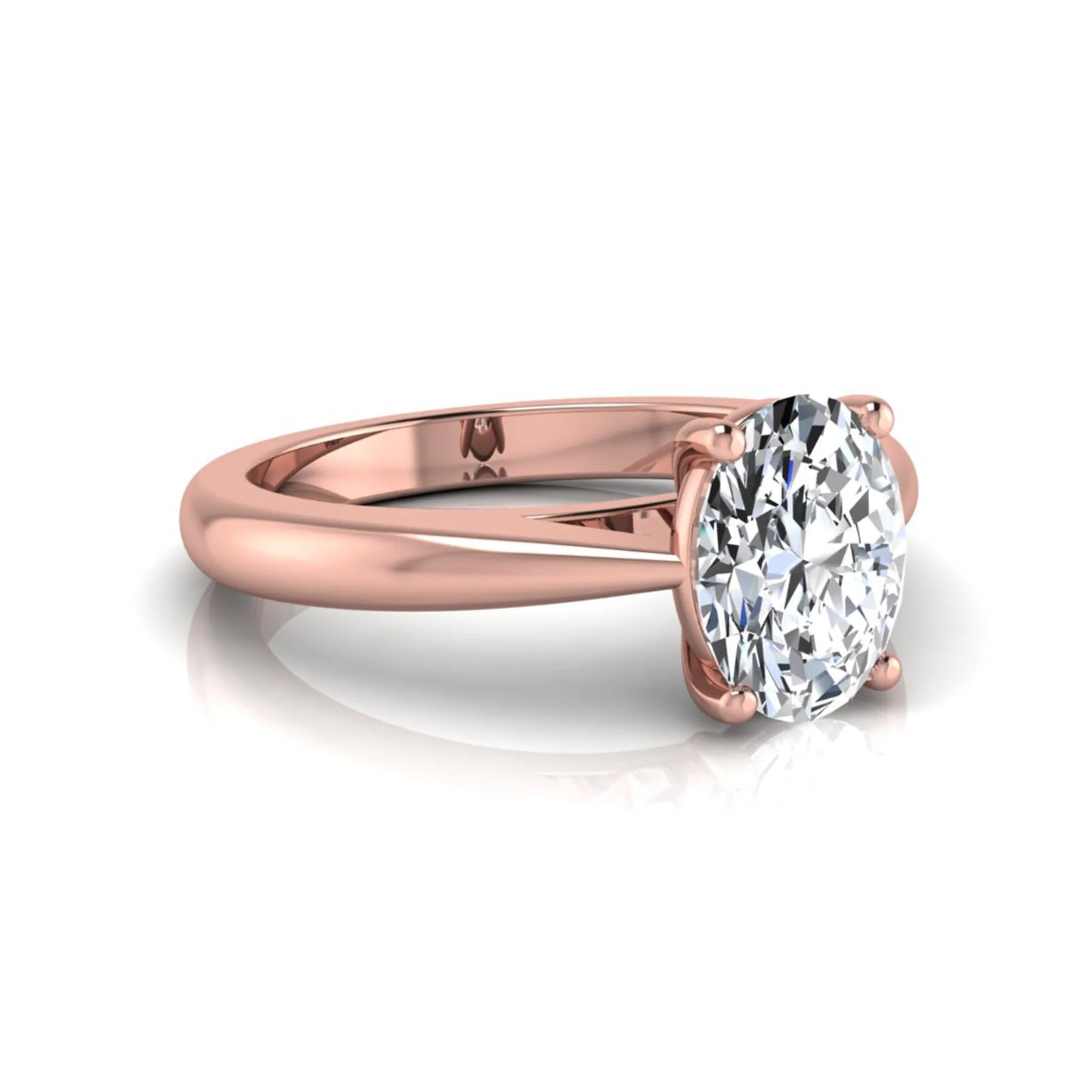Oval cut lab grown diamond solitaire engagement ring featuring a classic four-prong setting with a polished rose gold cathedral-style band.