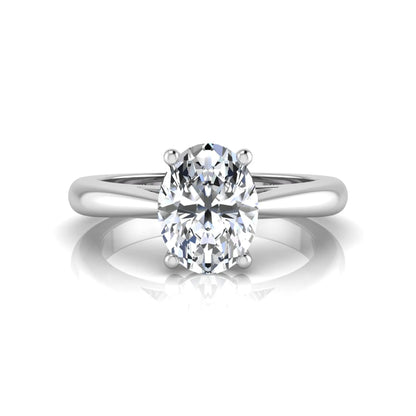 Oval cut lab grown diamond solitaire engagement ring featuring a classic four-prong setting with a polished white gold cathedral-style band.