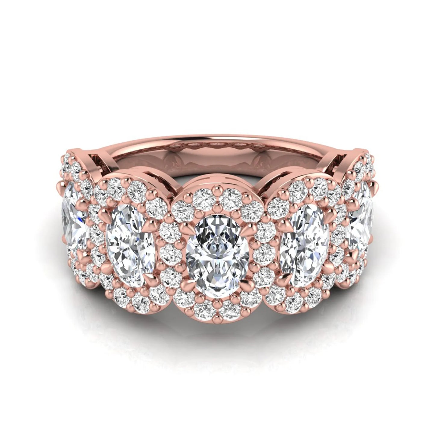 Oval and round cut lab grown diamond halo band ring featuring multiple oval diamonds with sparkling round halo accents in rose gold design