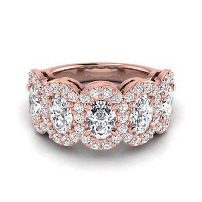 Oval and round cut lab grown diamond halo band ring featuring multiple oval diamonds with sparkling round halo accents in rose gold design
