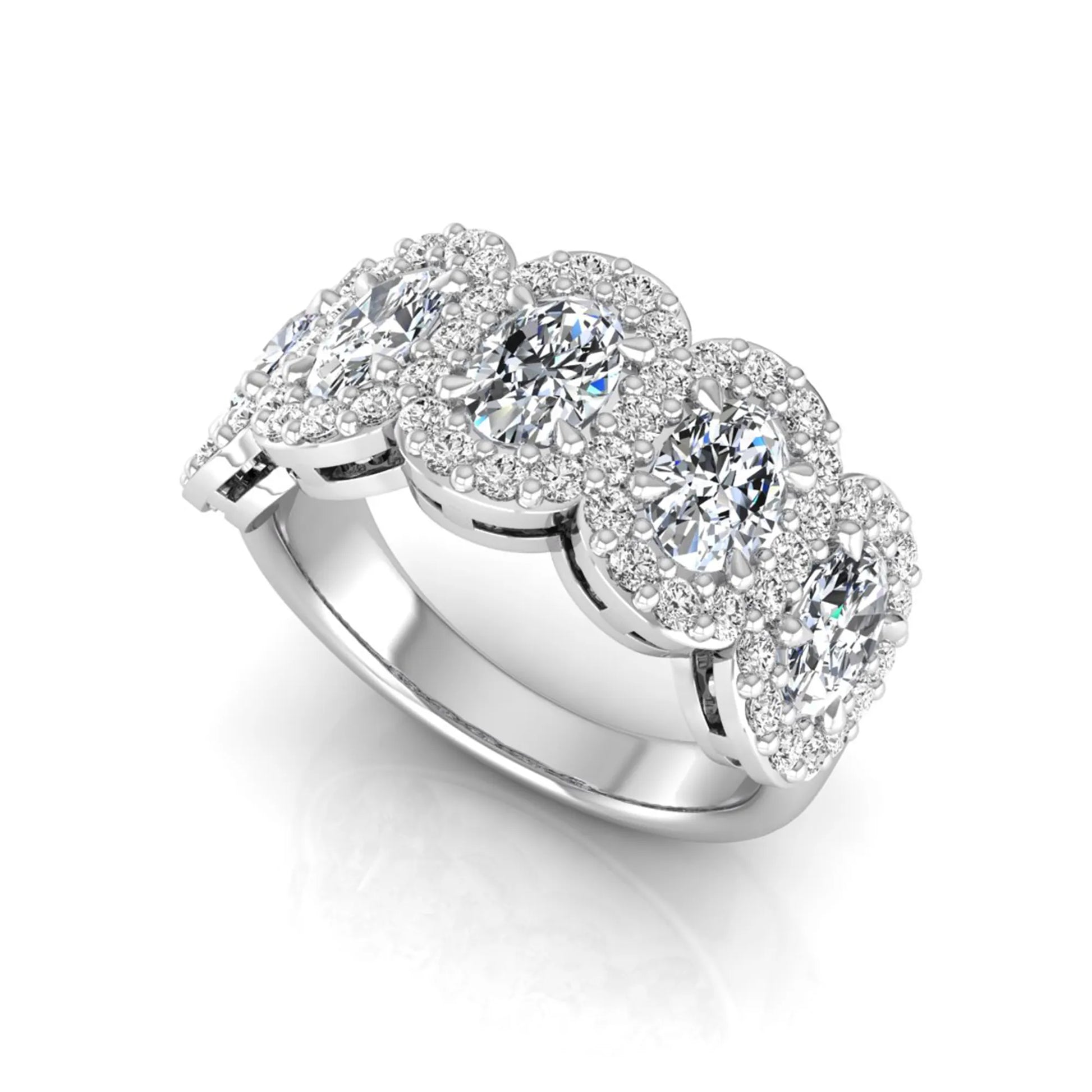 Oval and round cut lab grown diamond halo band ring featuring multiple oval diamonds with sparkling round halo accents in white gold design