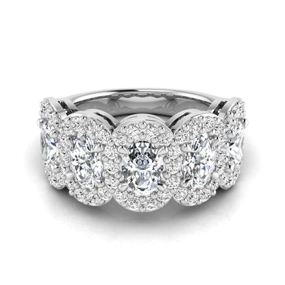 Oval and round cut lab grown diamond halo band ring featuring multiple oval diamonds with sparkling round halo accents in white gold design