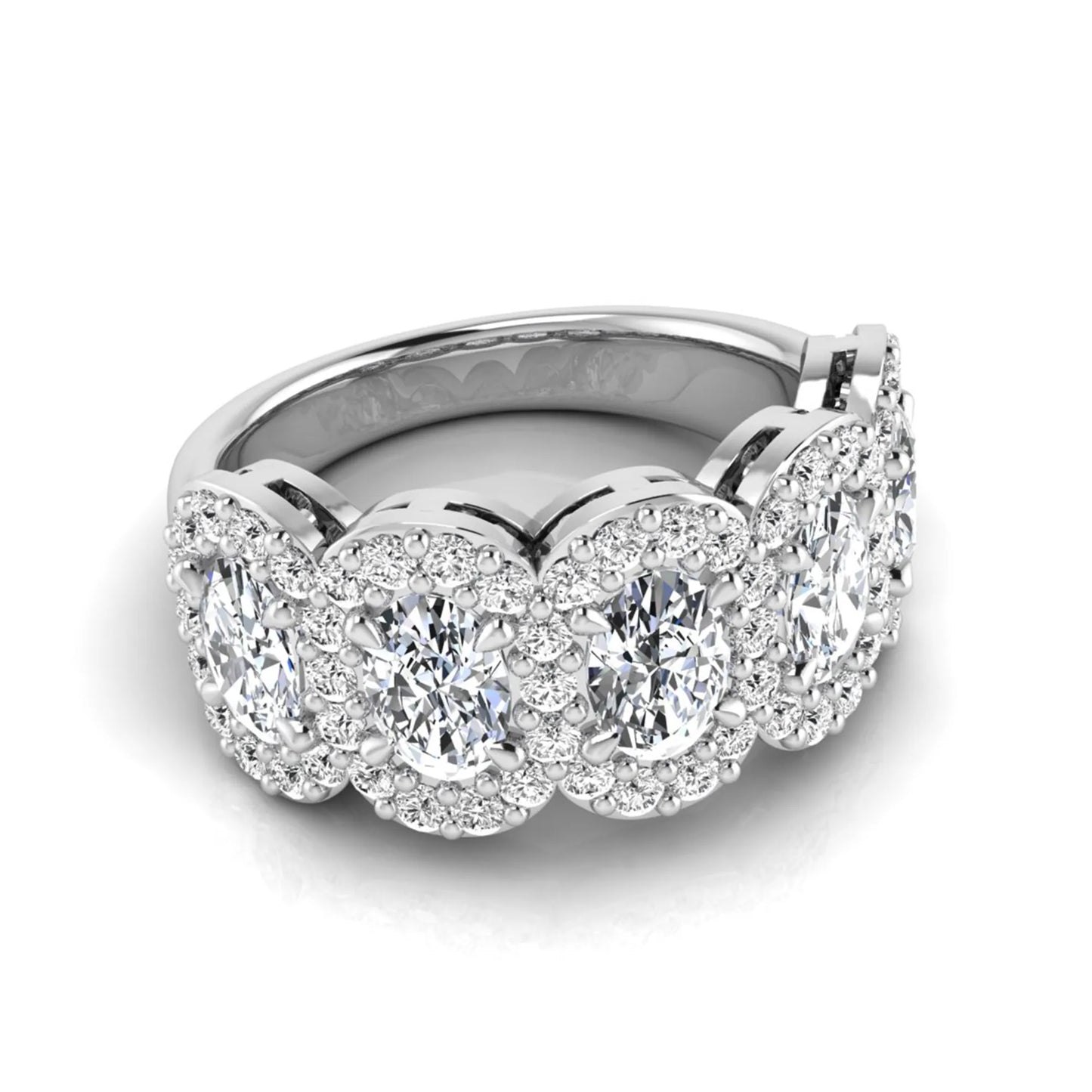 Oval and round cut lab grown diamond halo band ring featuring multiple oval diamonds with sparkling round halo accents in white gold design