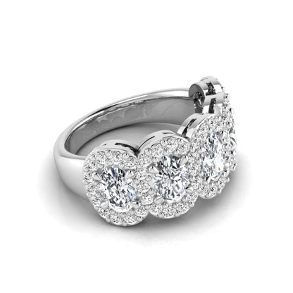 Oval and round cut lab grown diamond halo band ring featuring multiple oval diamonds with sparkling round halo accents in white gold design