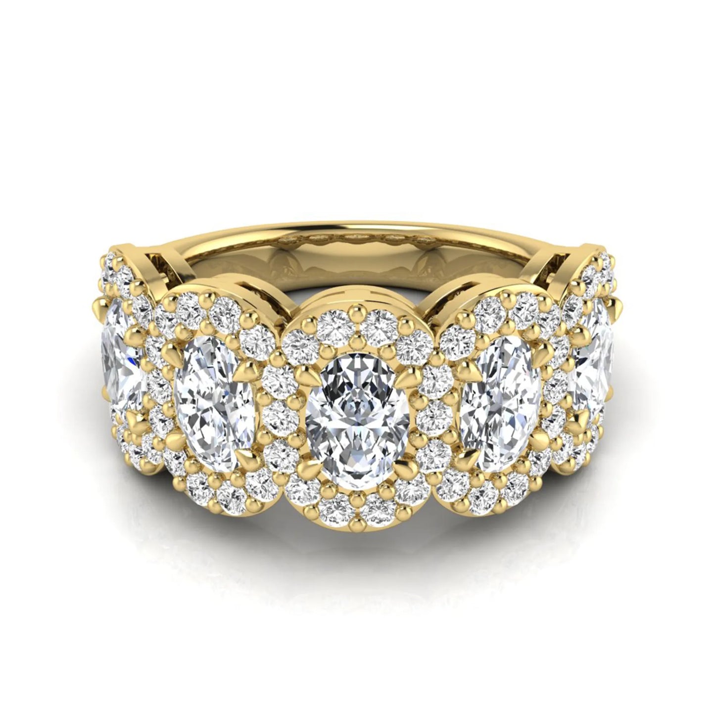 Oval and round cut lab grown diamond halo band ring featuring multiple oval diamonds with sparkling round halo accents in yellow gold design