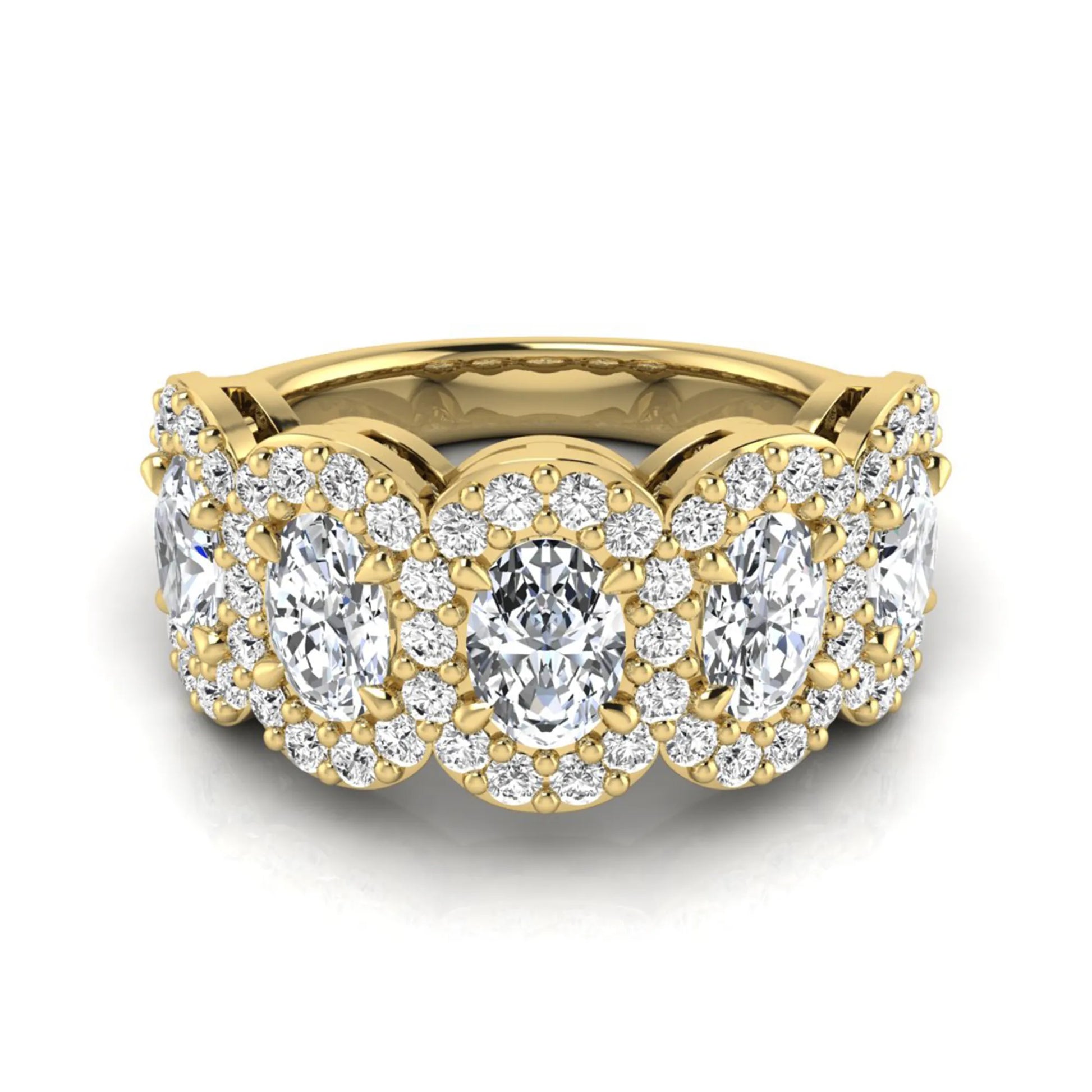 Oval and round cut lab grown diamond halo band ring featuring multiple oval diamonds with sparkling round halo accents in yellow gold design