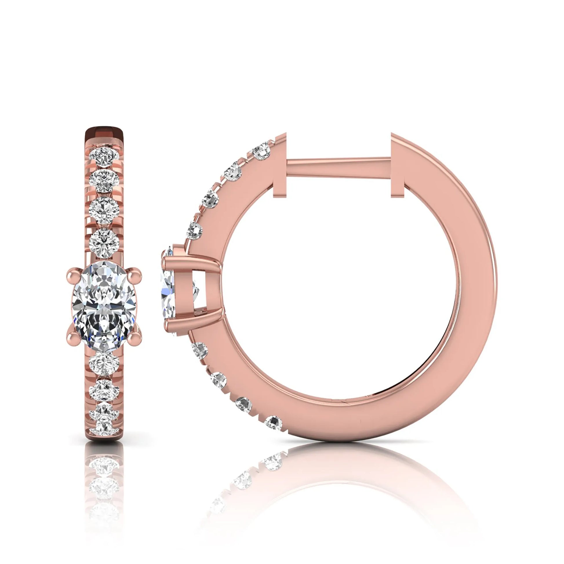 Oval and round lab grown diamond pavé huggie hoop earrings featuring a four prong oval center diamond with graduated shared prong round diamond accents in rose gold.