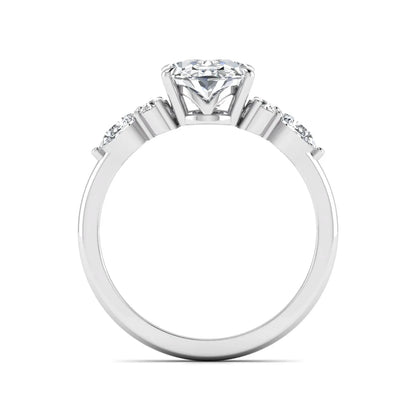 Oval Seven Stone Lab Grown Diamond Engagement Ring featuring a 10.00 × 7.00 mm oval-cut center diamond with round and pear-cut side diamonds in a multi-prong setting in white gold