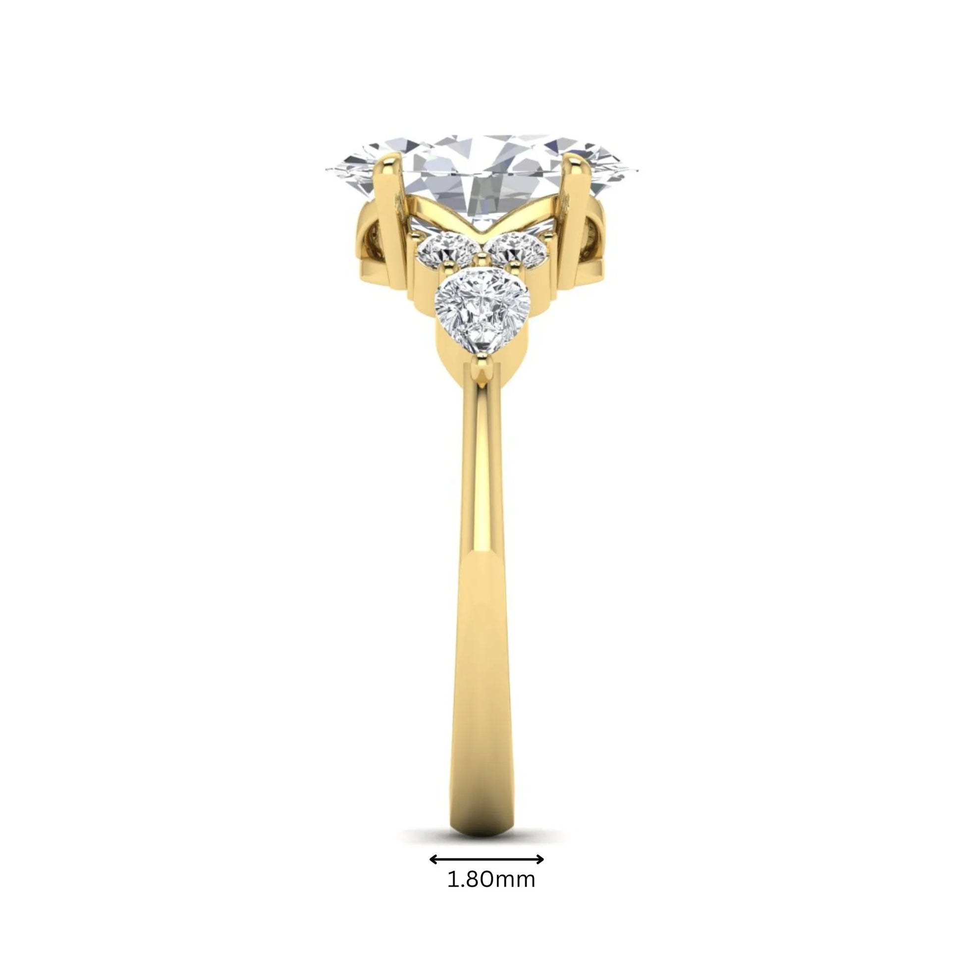 Oval Seven Stone Lab Grown Diamond Engagement Ring featuring a 10.00 × 7.00 mm oval-cut center diamond with round and pear-cut side diamonds in a multi-prong setting in yellow gold