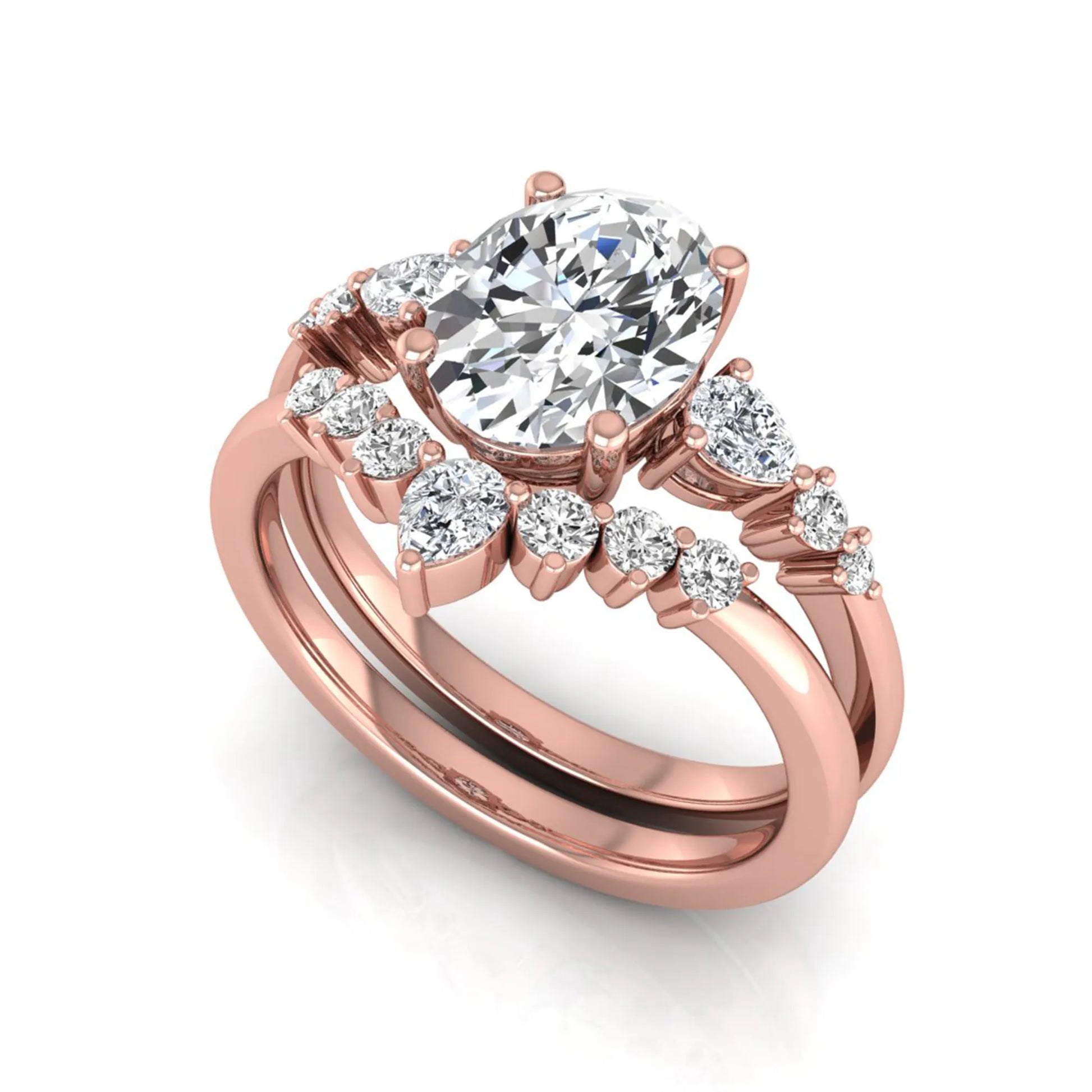 Oval cut lab grown diamond bridal ring set with pear and round side diamonds in rose gold tone