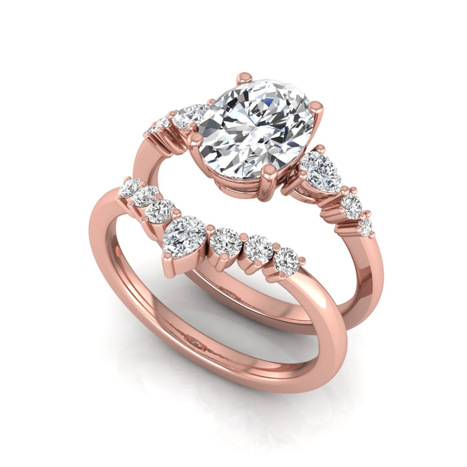 Oval cut lab grown diamond bridal ring set with pear and round side diamonds in rose gold tone