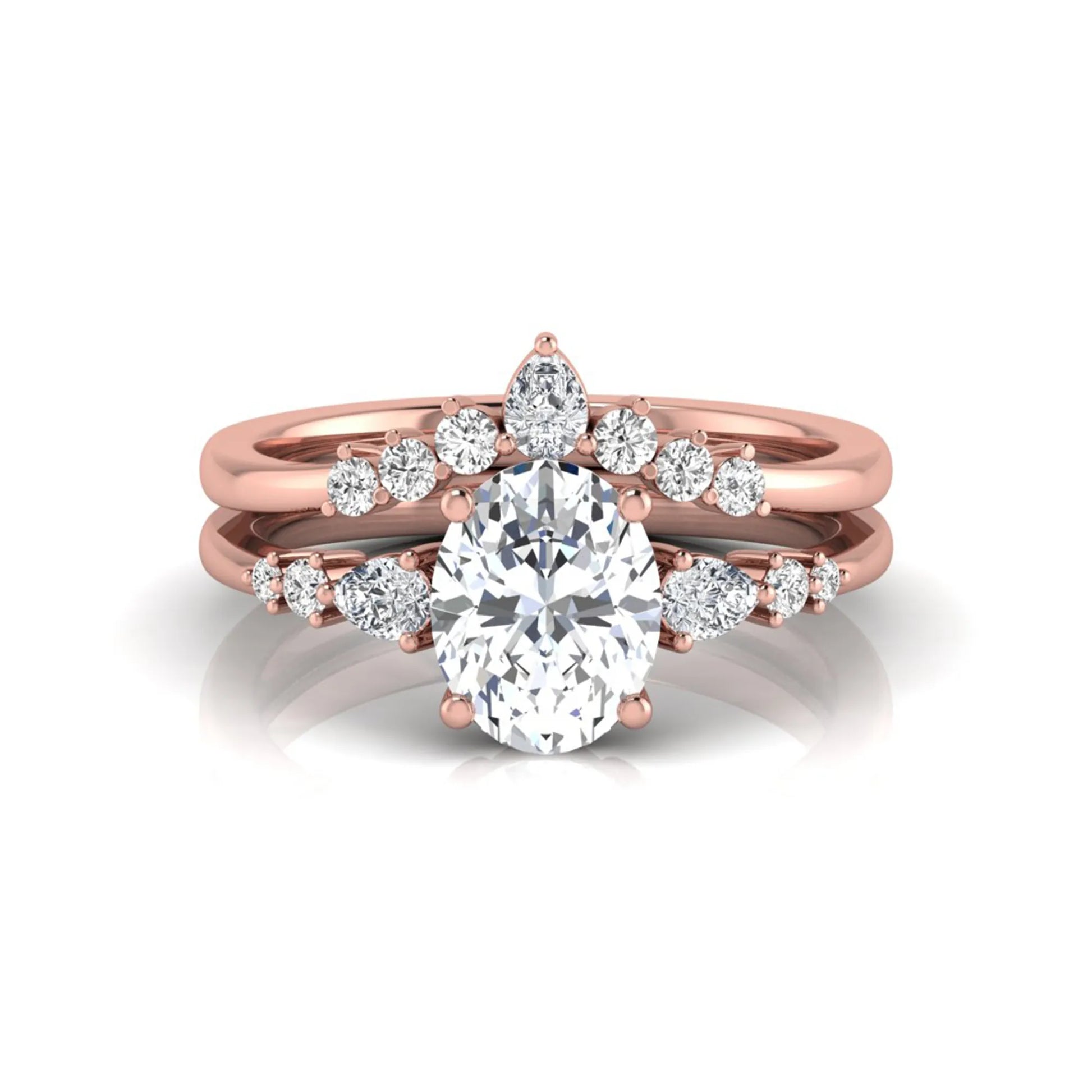 Oval cut lab grown diamond bridal ring set with pear and round side diamonds in rose gold tone