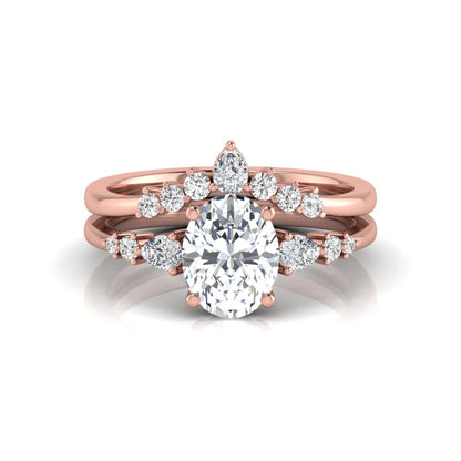 Oval cut lab grown diamond bridal ring set with pear and round side diamonds in rose gold tone