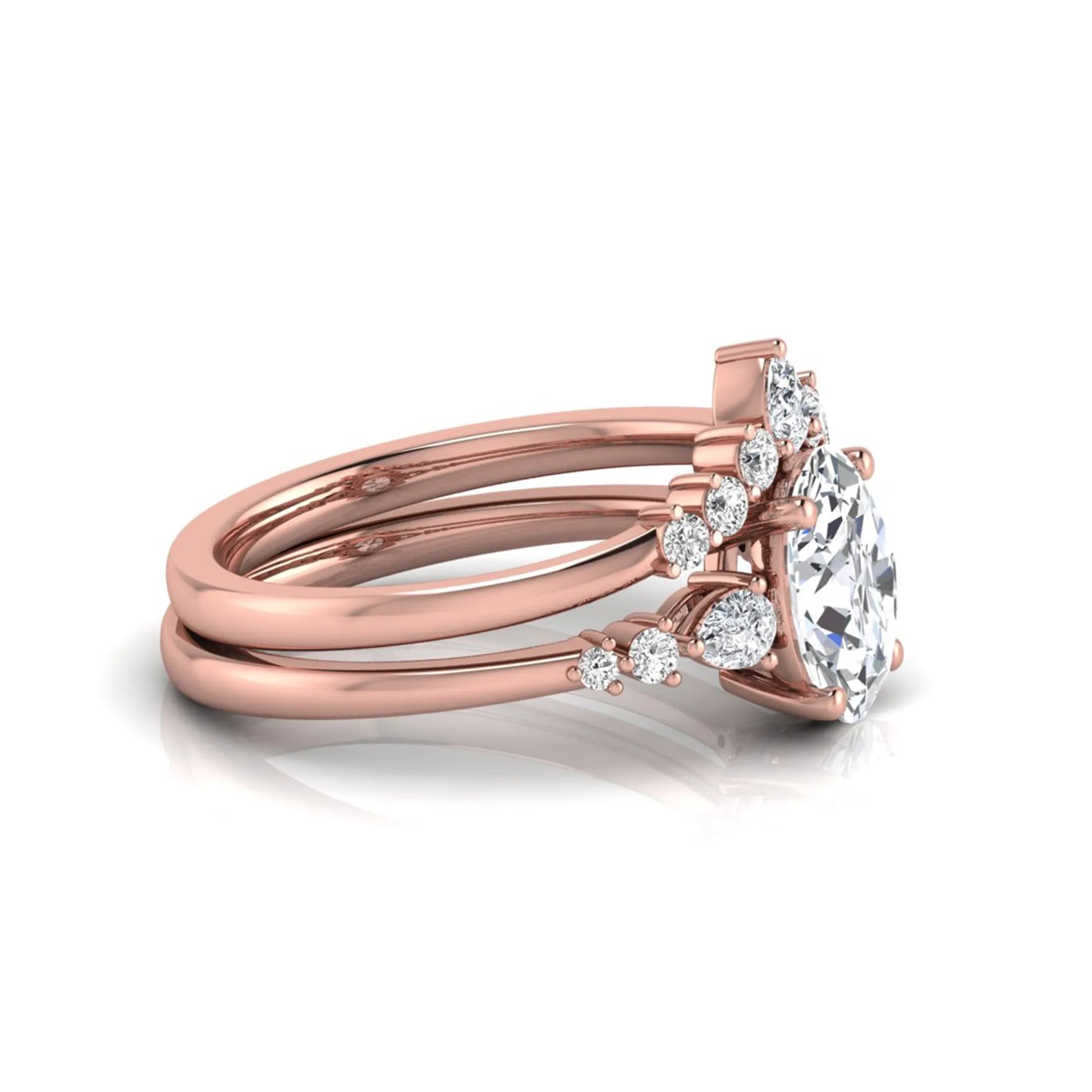 Oval cut lab grown diamond bridal ring set with pear and round side diamonds in rose gold tone