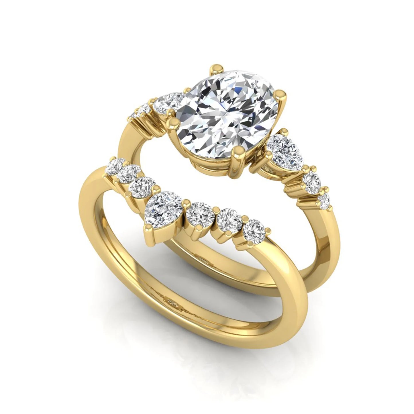 Oval cut lab grown diamond bridal ring set with pear and round side diamonds in yellow gold tone