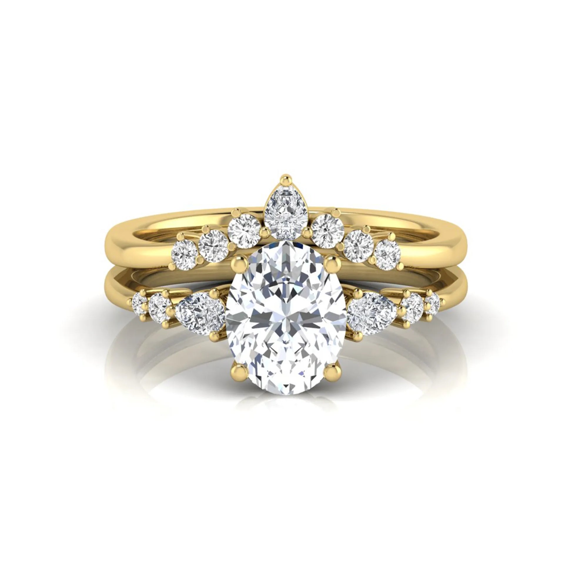 Oval cut lab grown diamond bridal ring set with pear and round side diamonds in yellow gold tone