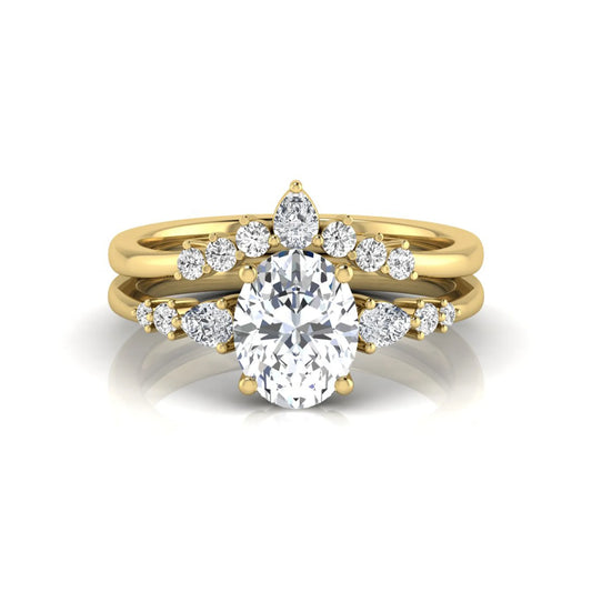 Oval cut lab grown diamond bridal ring set with pear and round side diamonds in yellow gold tone