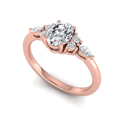 Oval cut lab grown diamond engagement ring with marquise and round side diamonds in rose gold tone