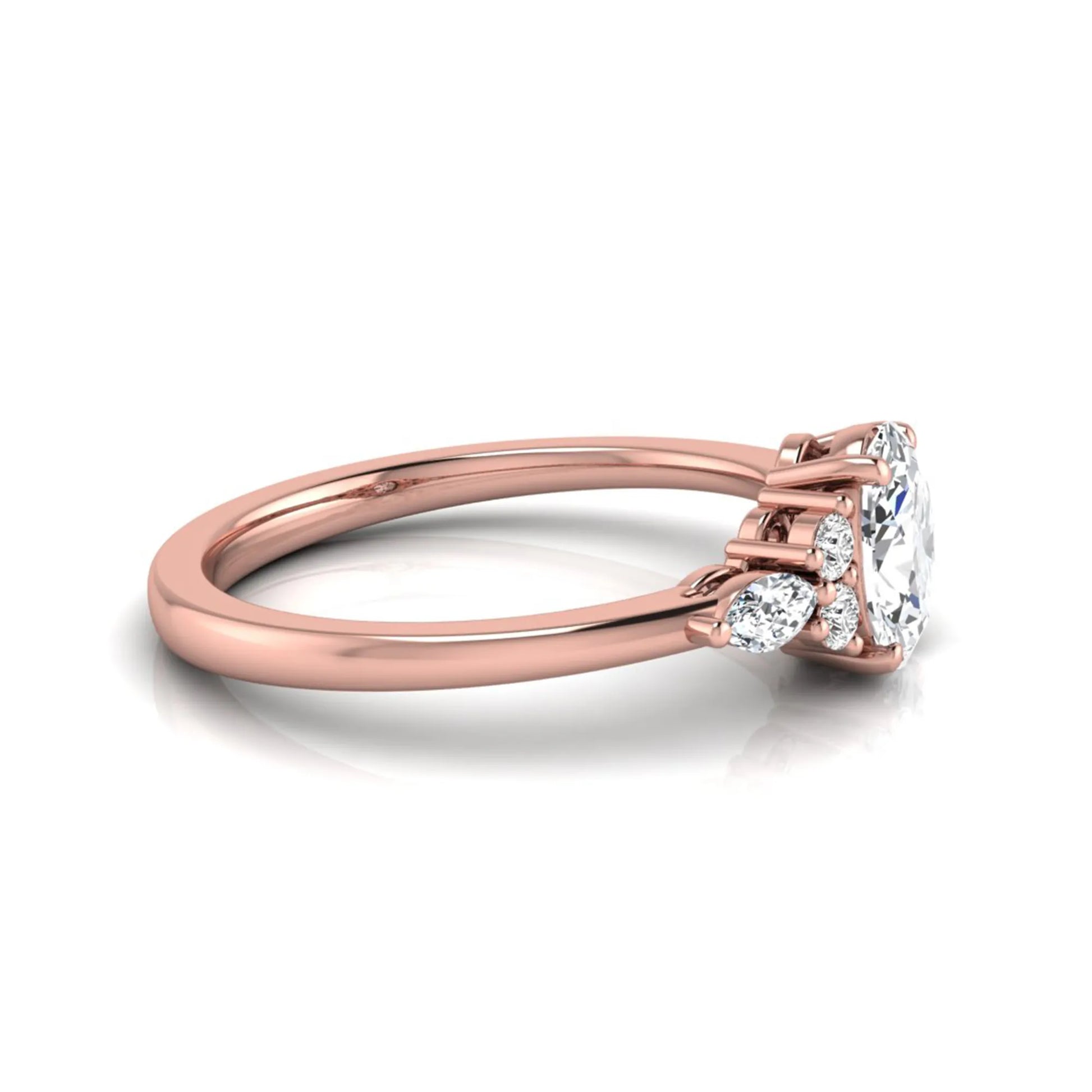 Oval cut lab grown diamond engagement ring with marquise and round side diamonds in rose gold tone