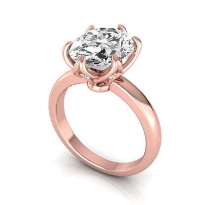 Oval six prong lab grown diamond solitaire engagement ring featuring a 2.54 carat oval center diamond with hidden round accent diamonds beneath the gallery.