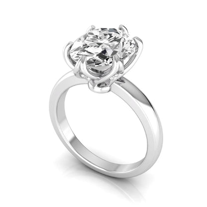 Oval six prong lab grown diamond solitaire engagement ring featuring a 2.54 carat oval center diamond with hidden round accent diamonds beneath the gallery.