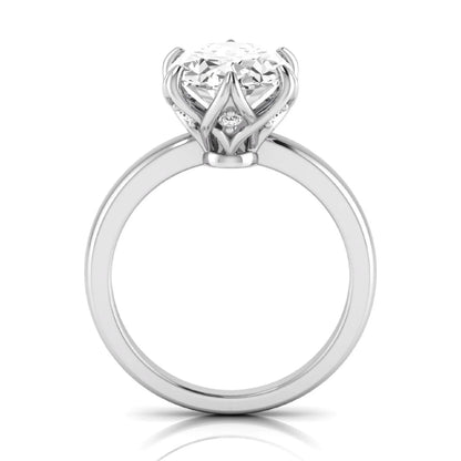 Oval six prong lab grown diamond solitaire engagement ring featuring a 2.54 carat oval center diamond with hidden round accent diamonds beneath the gallery.