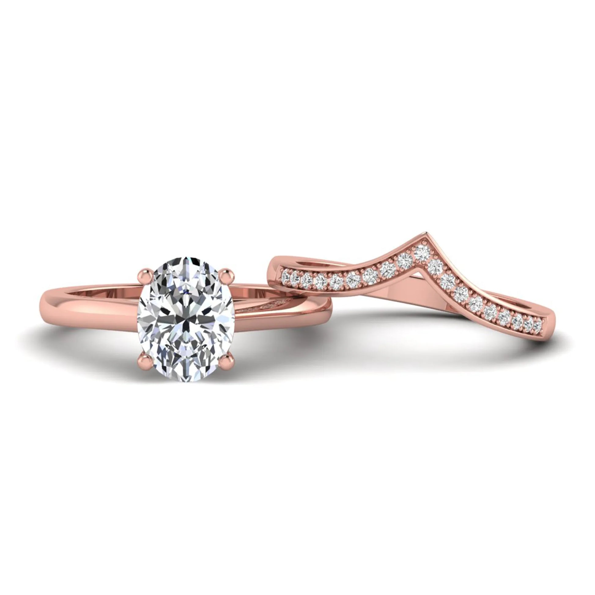Oval cut lab grown diamond bridal ring set featuring a four-prong solitaire engagement ring with a pavé chevron V-shaped wedding band in a rose gold finish.