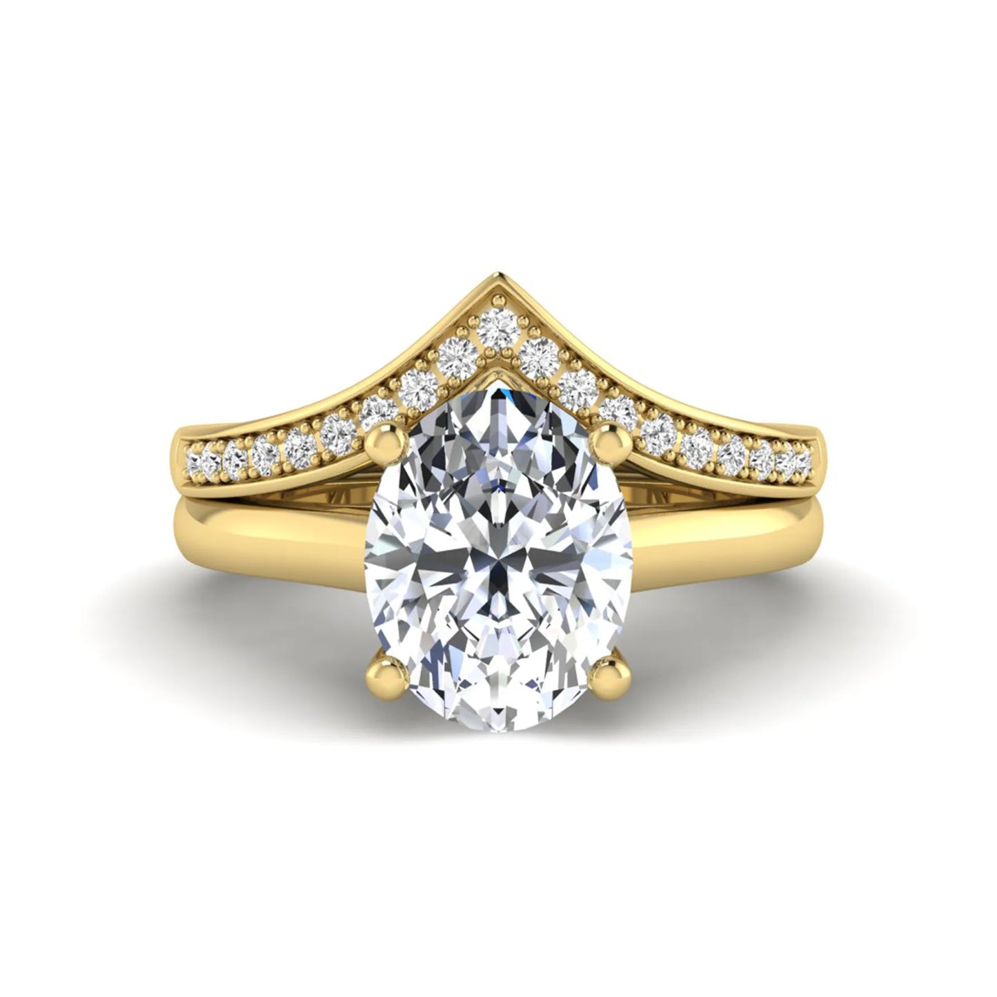 Oval cut lab grown diamond bridal ring set featuring a four-prong solitaire engagement ring with a pavé chevron V-shaped wedding band in a yellow gold finish.